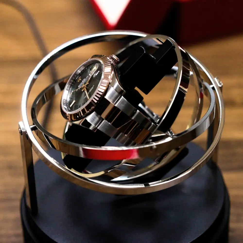 Remontoir gyroscopique pour montre automatique en verre et acier - vue de côté