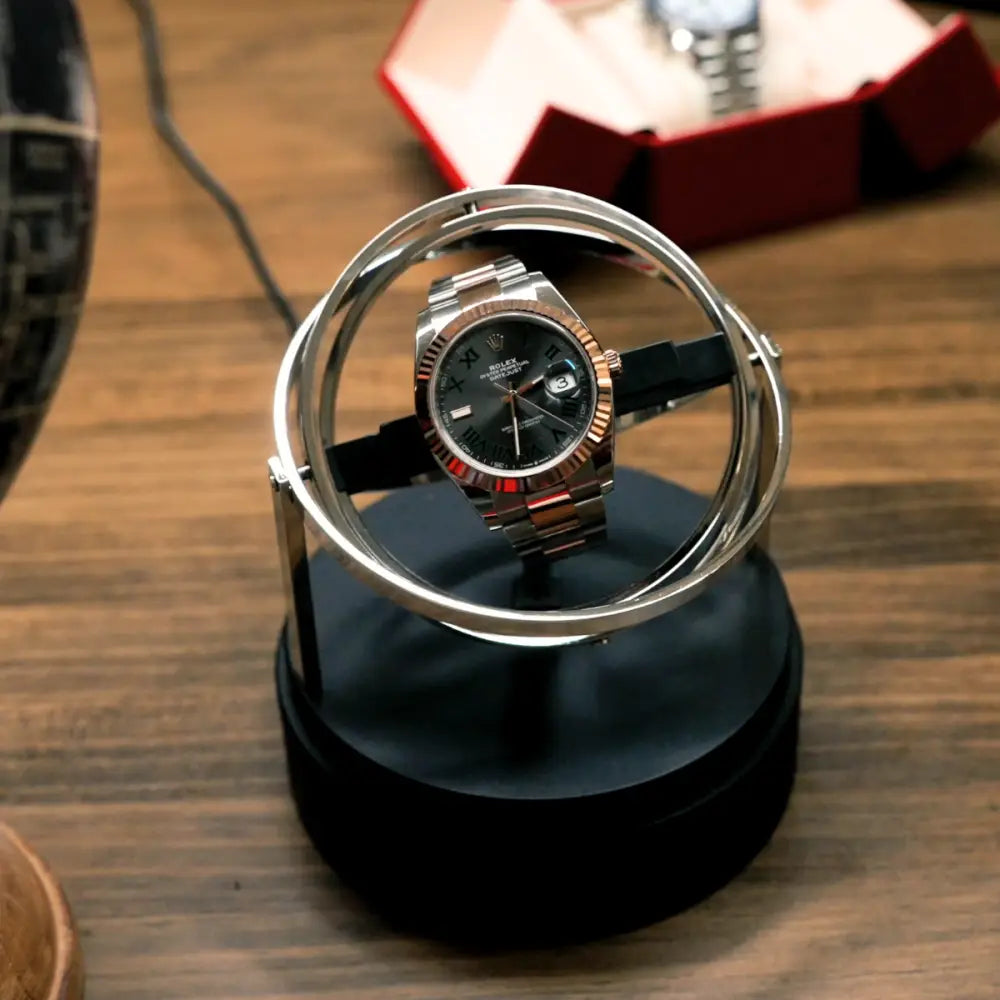 Remontoir gyroscopique pour montre automatique en verre et acier - vue de face
